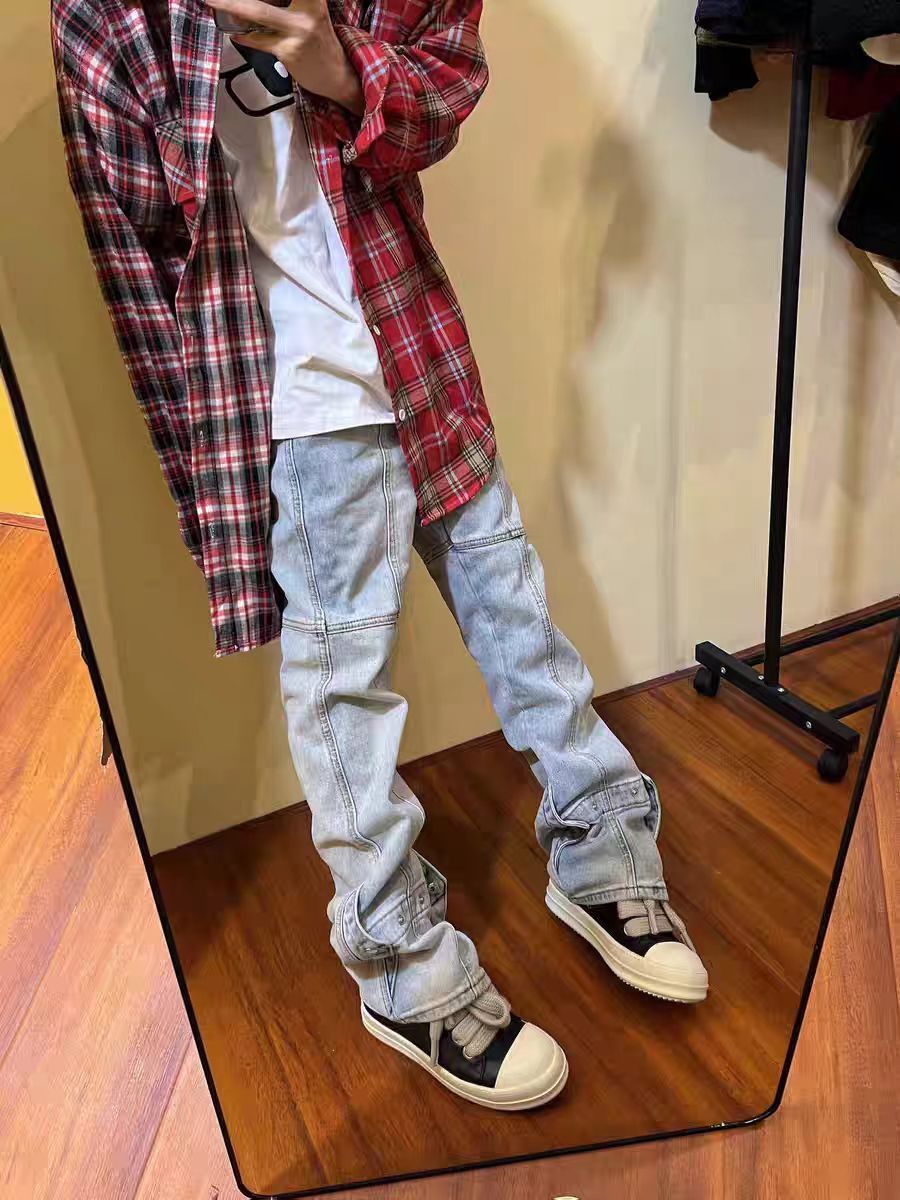 Washed and stacked distressed button down jeans