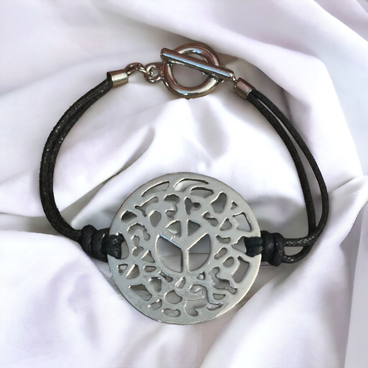 Other Silver tone filigree Peace cord toggle bracelet Size ONE SIZE - 1 Thumbnail