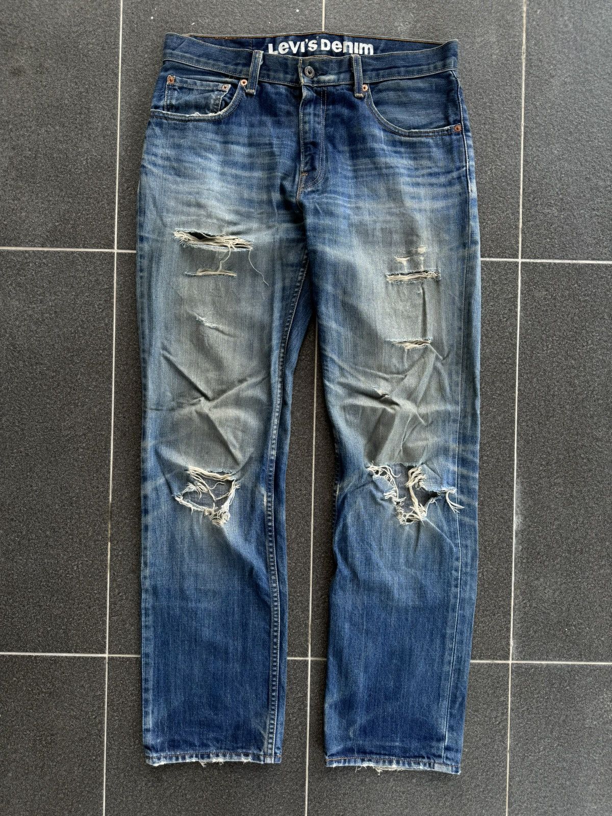 image of Distressed Denim x Levis Vintage Levis 502 Distressed Blue Denim Jeans, Men's (Size 34)
