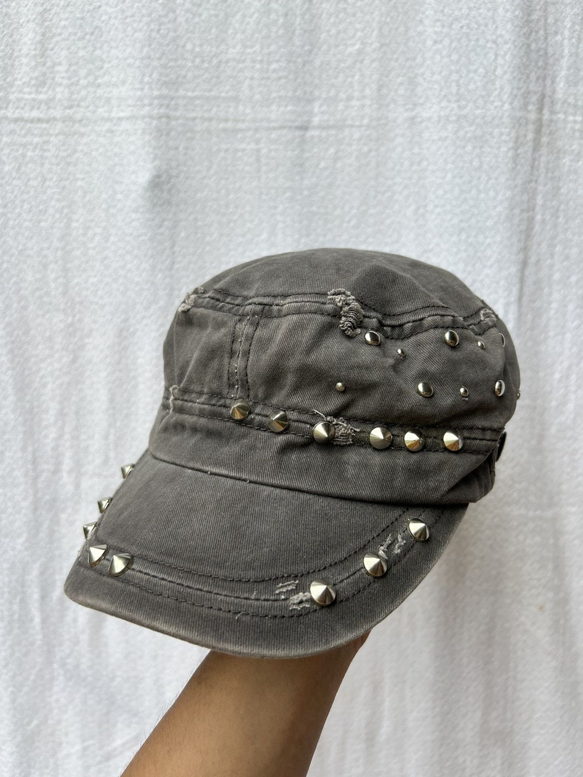 Distressed studded gothic style hats