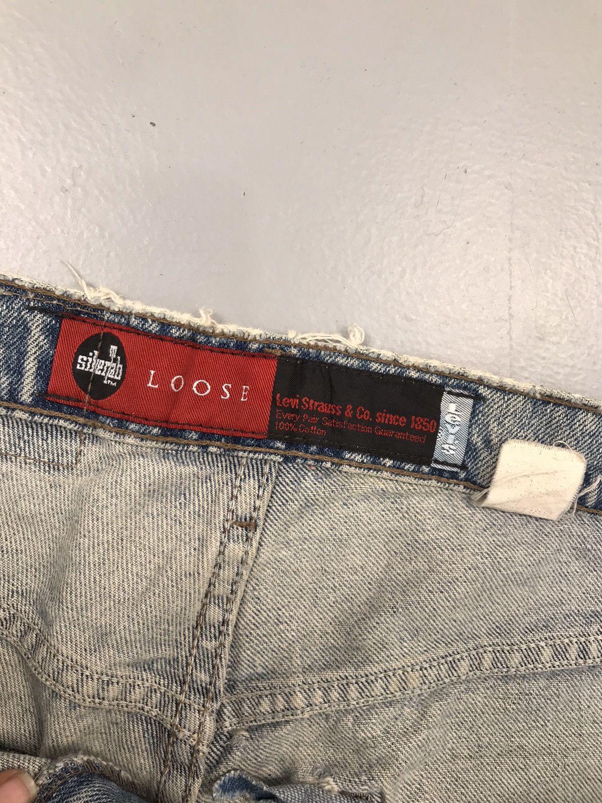 Vintage Levi’s silver tab damaged denim
