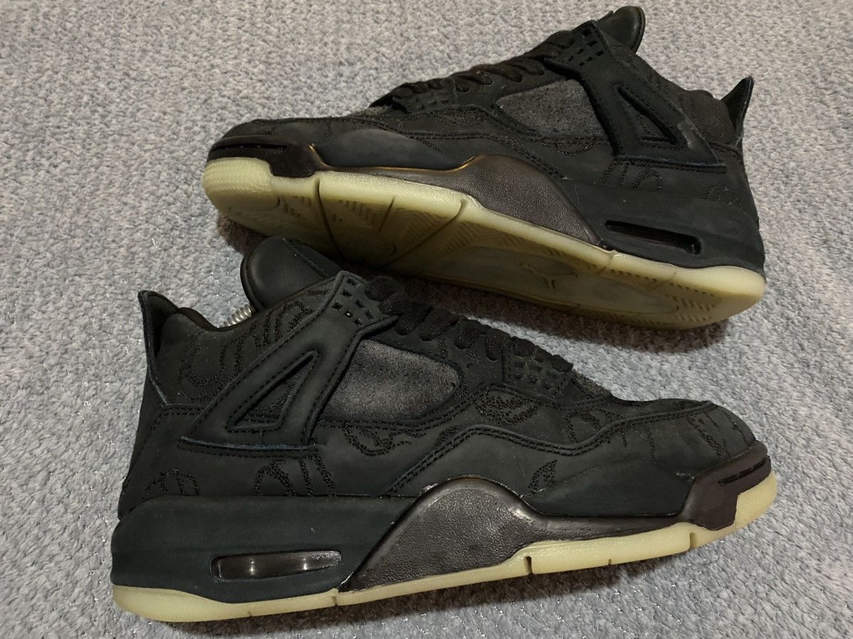 Jordan Brand × Kaws Nike Air Jordan 4 x Kaws "Black" Size US 7 / EU 40 - 1 Thumbnail