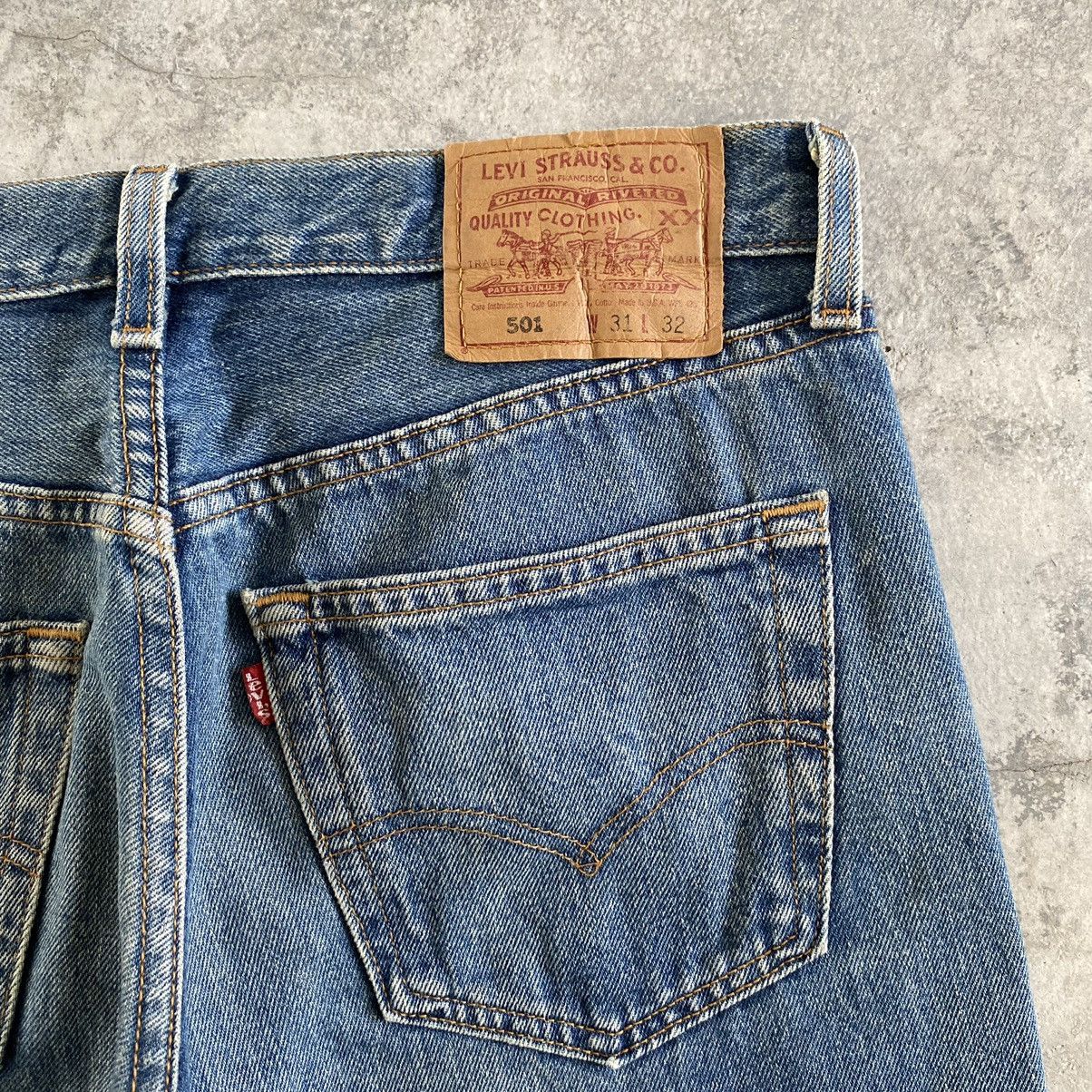 Levi's Vintage 1996 Levi’s 501 Faded Blue Ripped Denim Jeans Size US 31 - 19 Thumbnail