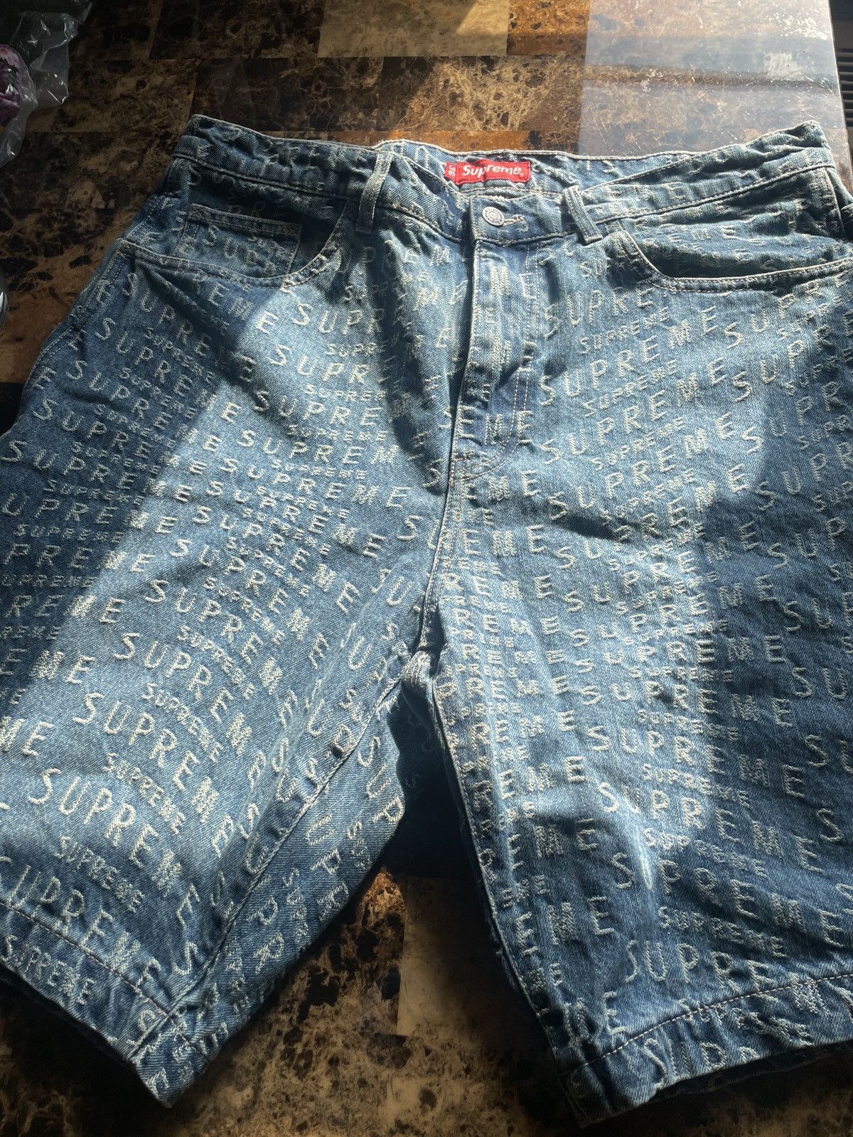 image of Supreme Warp Jacquard Logos Painter Shorts in Blue Denim, Men's (Size 36)