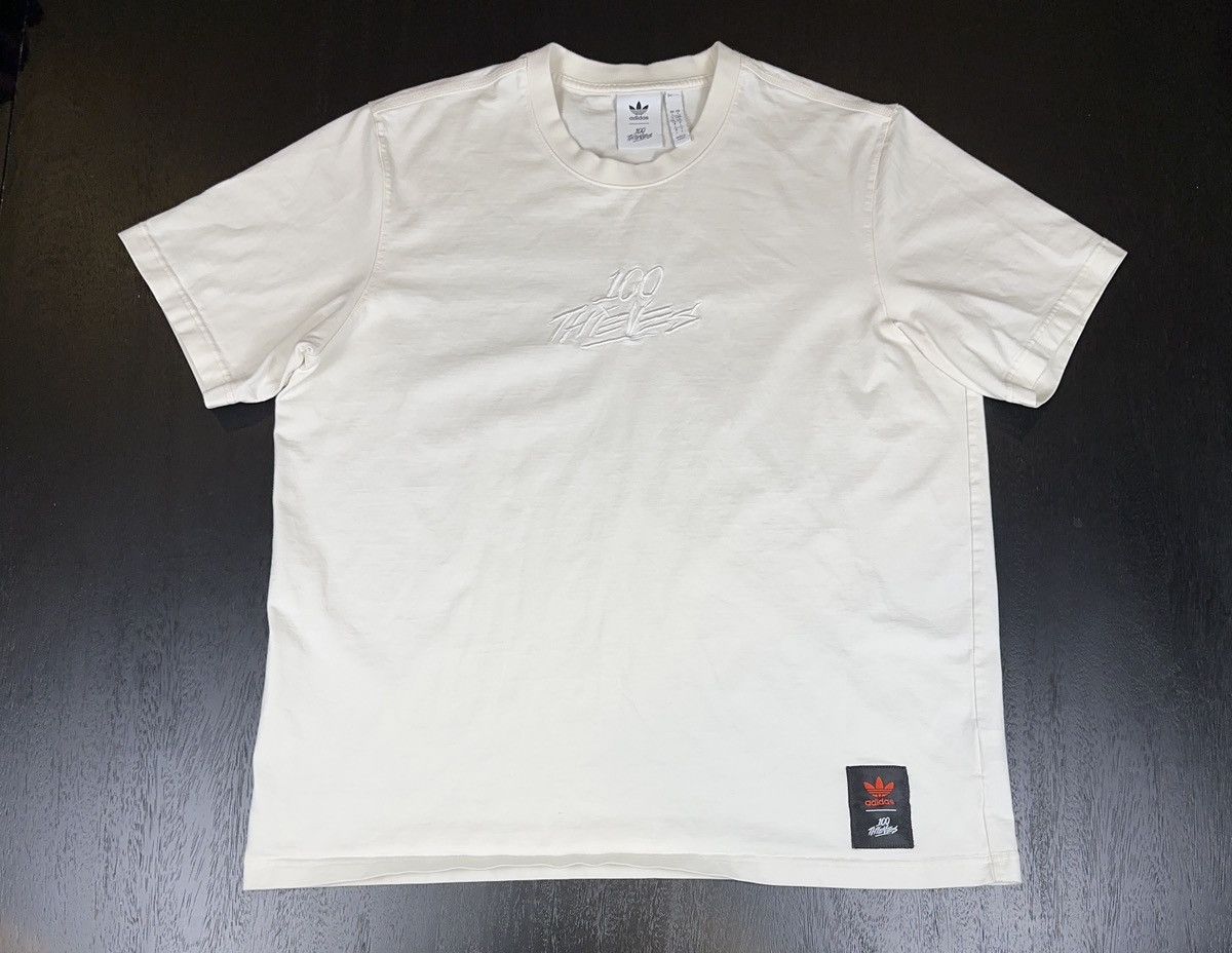 100 Thieves × Adidas 100 Thieves x Adidas Tee — Center Logo (L) Size US L / EU 52-54 / 3 - 1 Thumbnail