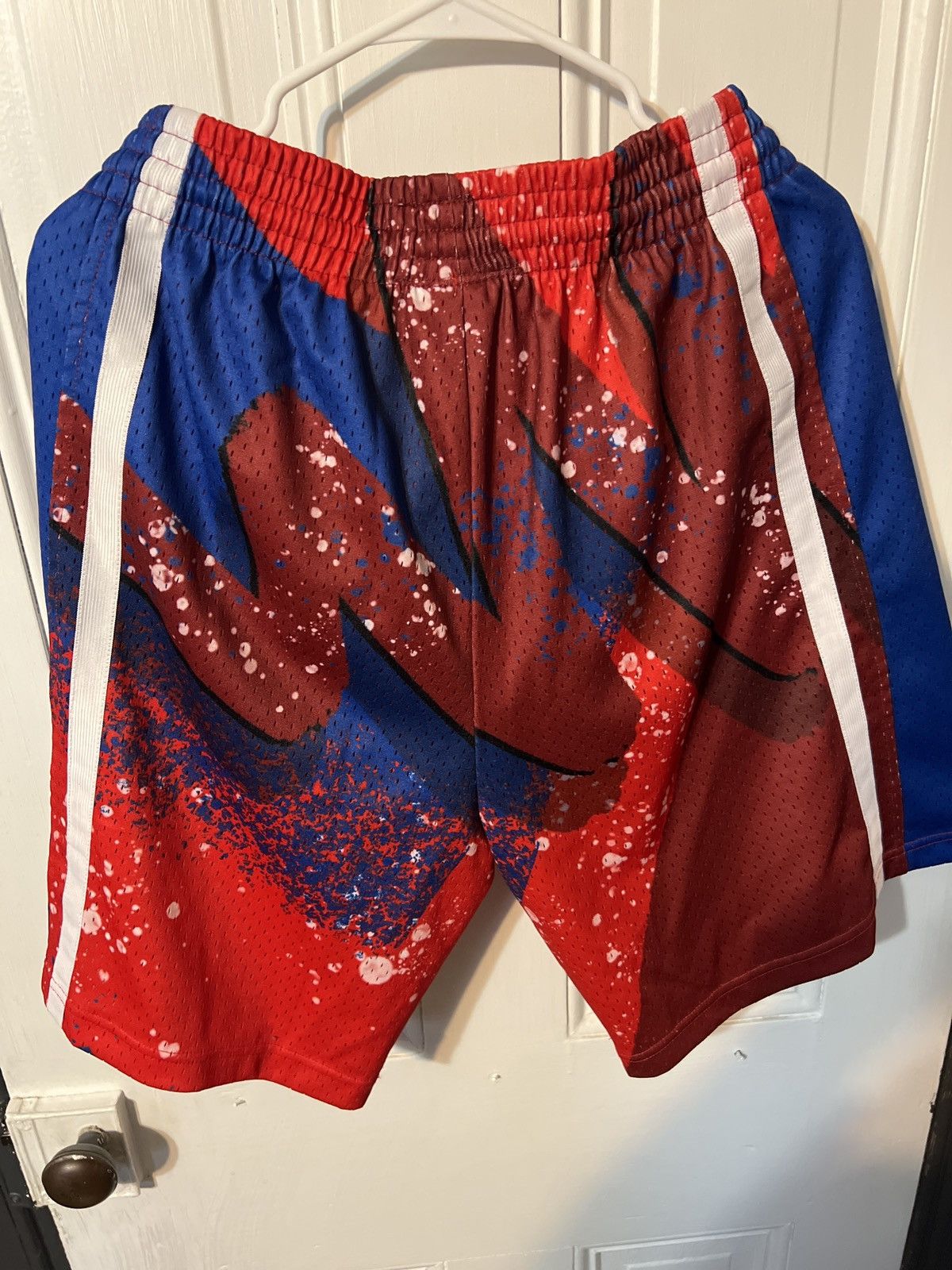 image of Mitchell Ness x NBA Mitchell And Ness Swingman Shorts in Blue/Red/White, Men's (Size 38)