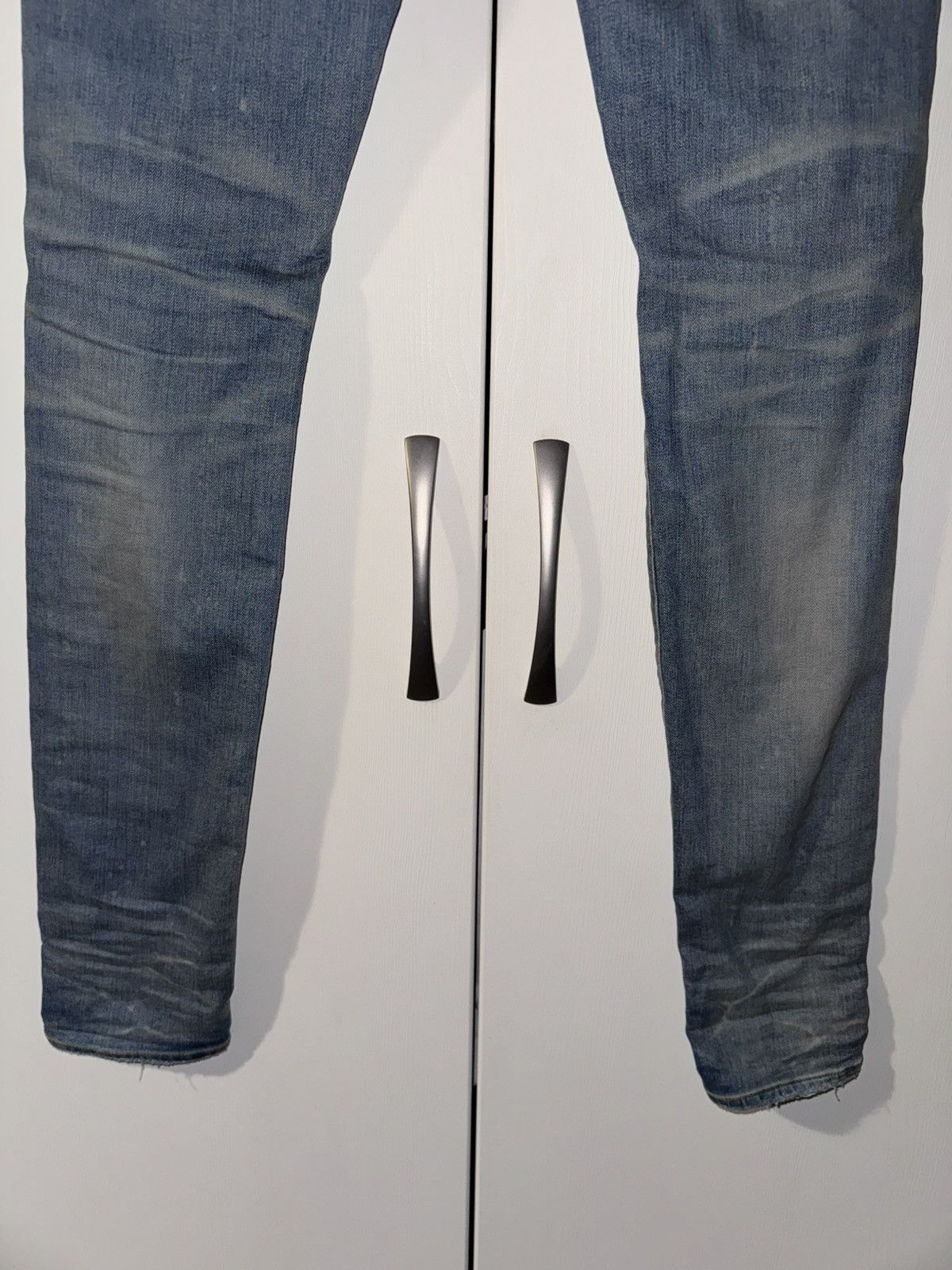 AMIRI BLUE DISTRESSED JEANS