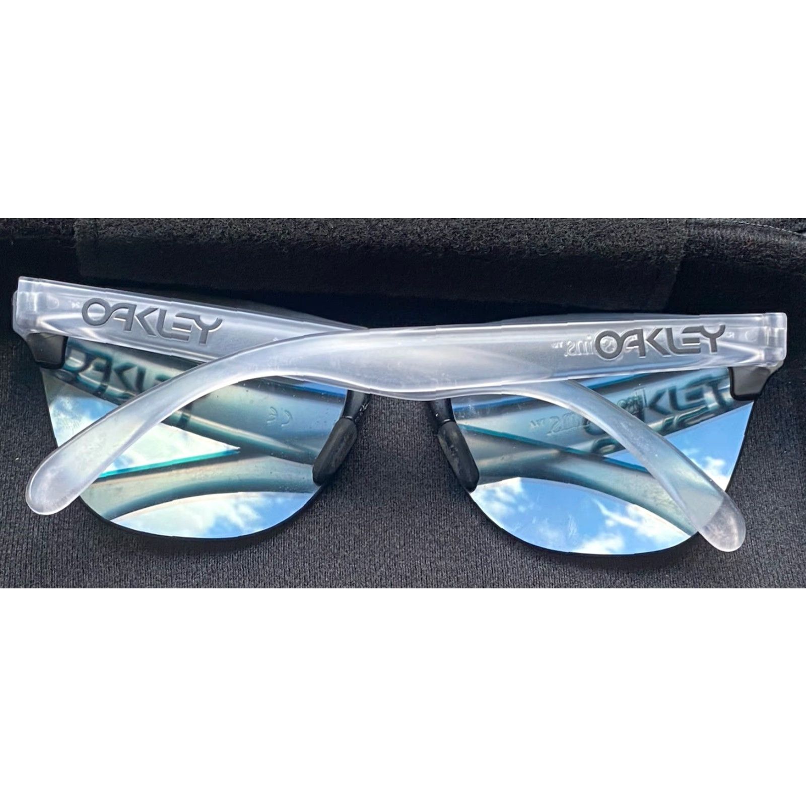 Oakley Oakley Frogskins Sunglasses Unisex Adults Clear/Black Frame Prizm Sapphire Blue Reflective Lenses Size ONE SIZE - 6 Thumbnail