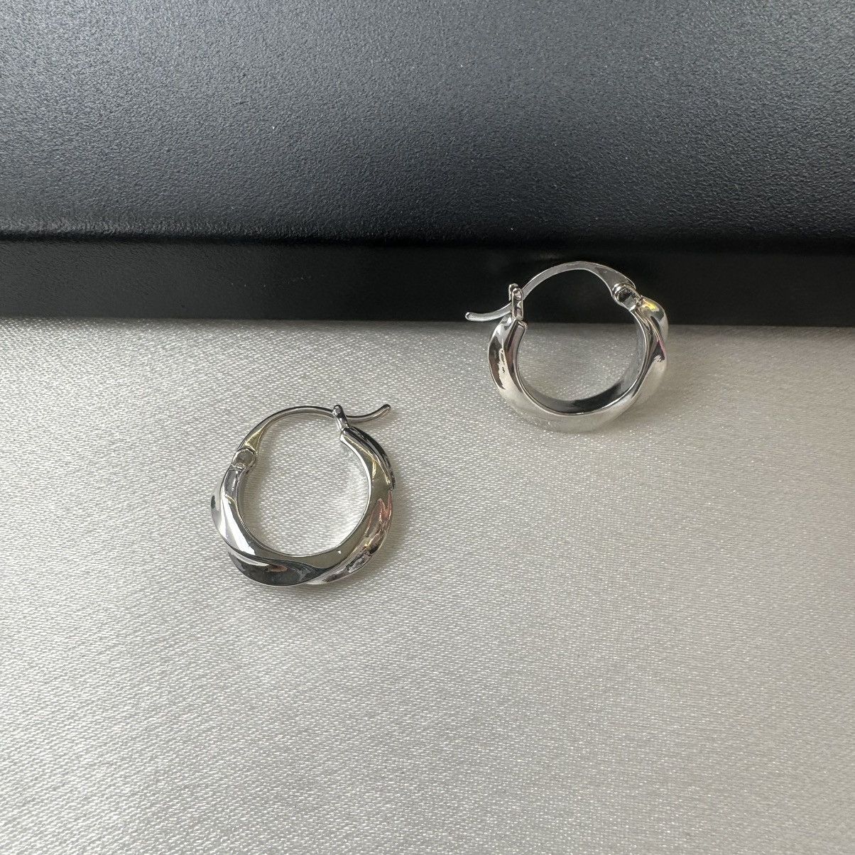 Designer Twisted Silver Hoop Earrings for Women Size ONE SIZE - 2 Thumbnail