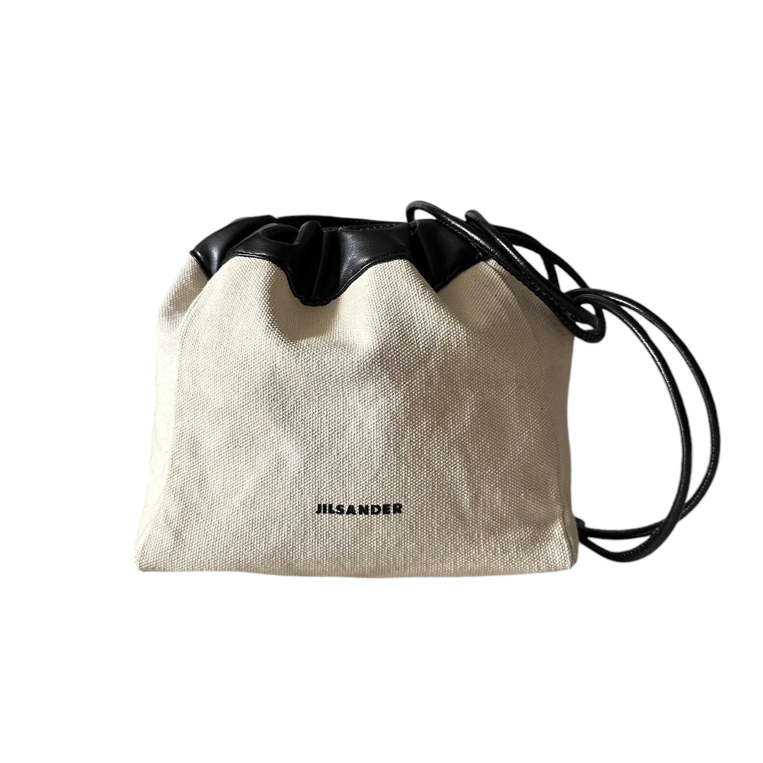 Off white string bag best sale