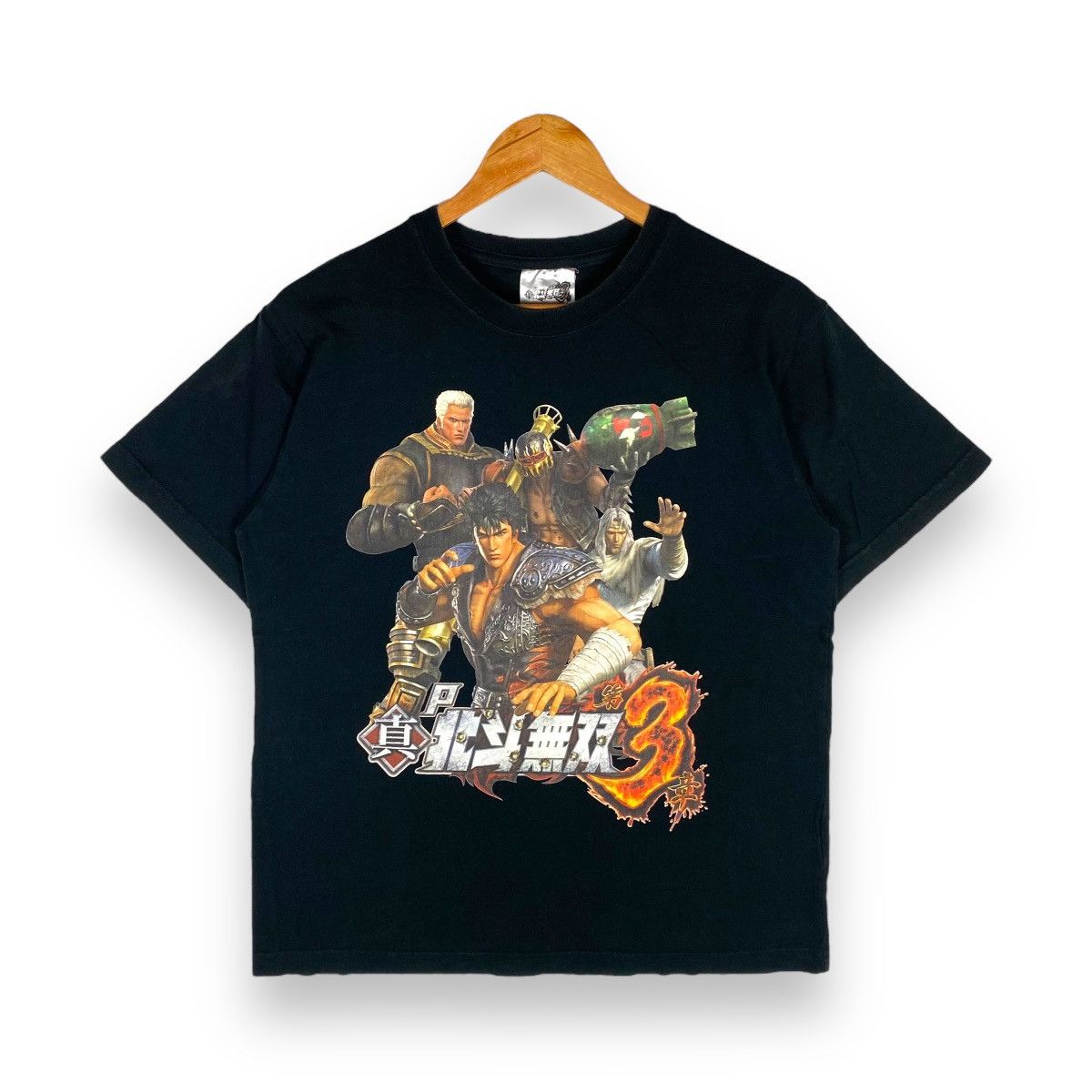 image of Anima x Cartoon Network Fist Of The North Star / Hokuto No Ken Anime Game Tee in Black (Size Large)