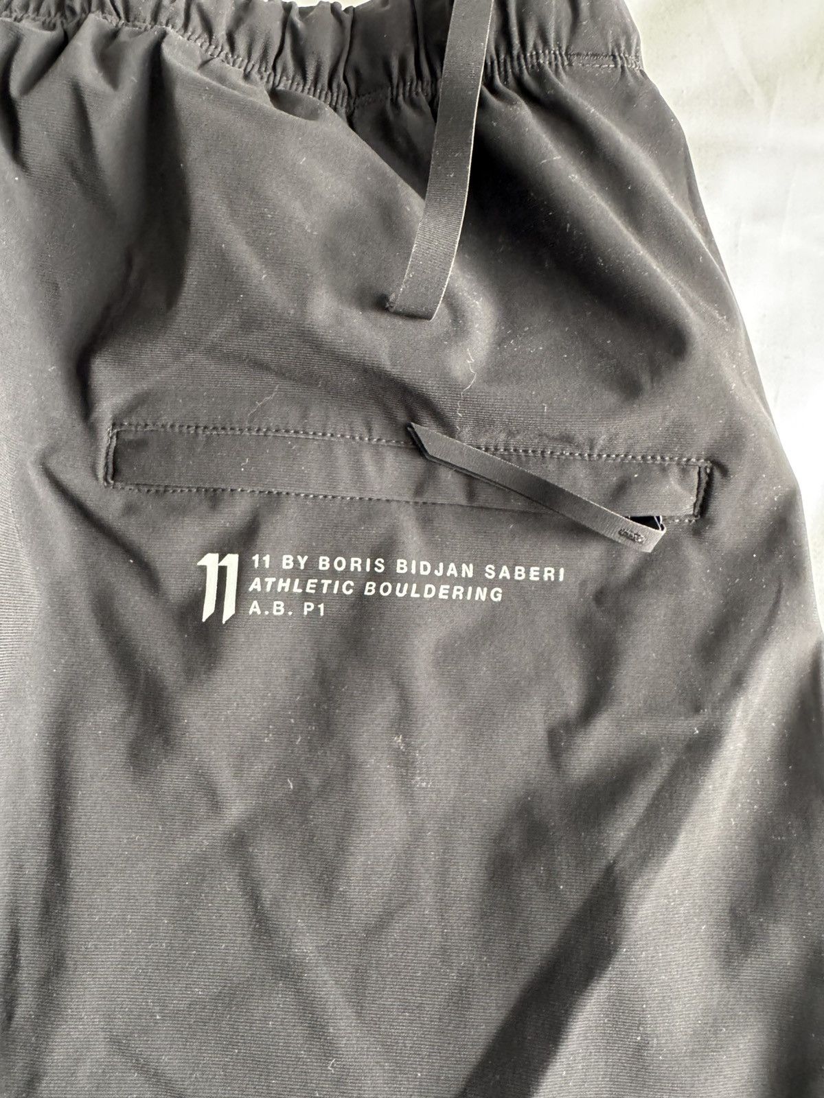 11 By Boris Bidjan Saberi × Salomon Casual black pants. Can be worn strapped up. Size US 30 / EU 46 - 6 Thumbnail