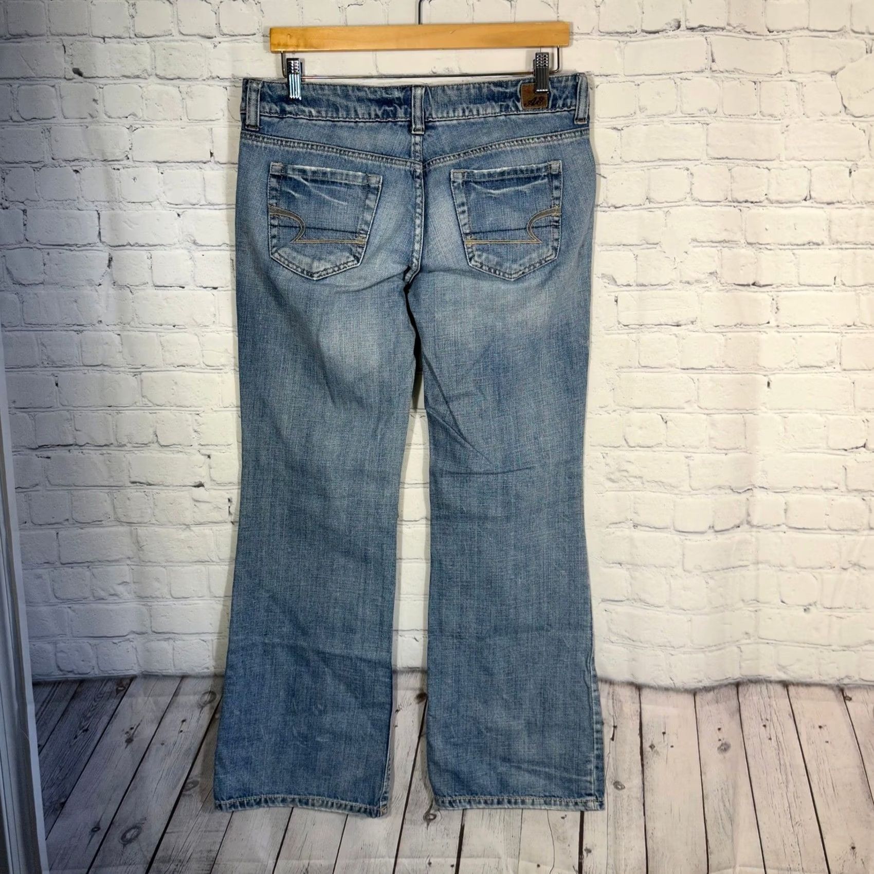 American Eagle Outfitters VINTAGE? No. American Eagle Outfitters Low Rise Flare Jeans Medium Wash Distressed Blue Denim Womens 12 Size 24" / US 00 / IT 34 - 7 Thumbnail