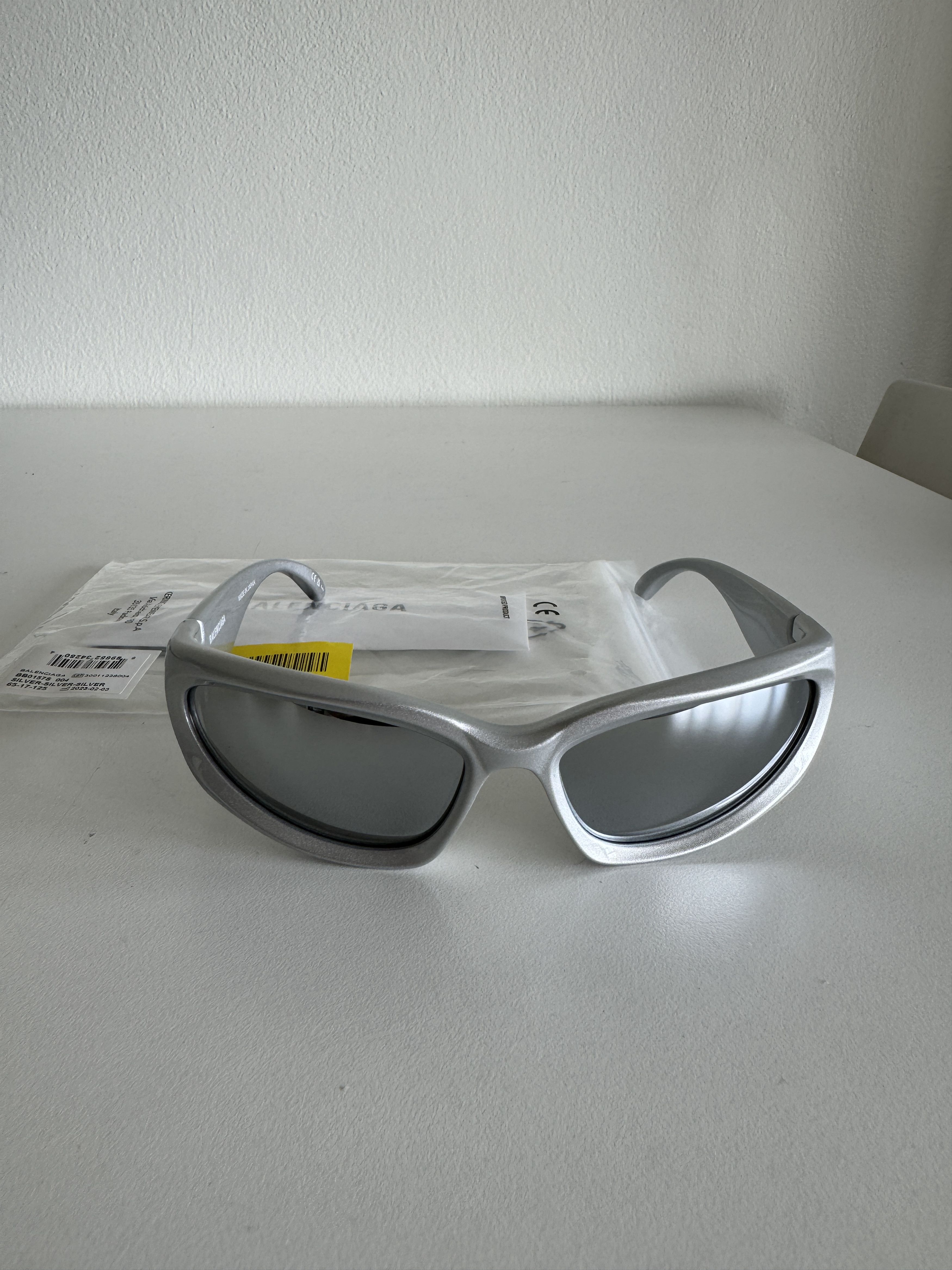 Balenciaga sunglasses BB0157S 004 silver swift wrap oval