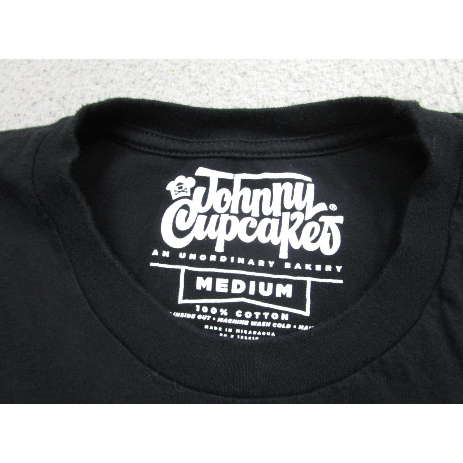 Johnny Cupcakes VINTAGE Johnny Cupcakes Black Graphic T-Shirt Mens Medium Food & Drink Parody Streetwear Size US M / EU 48-50 / 2 - 4 Thumbnail