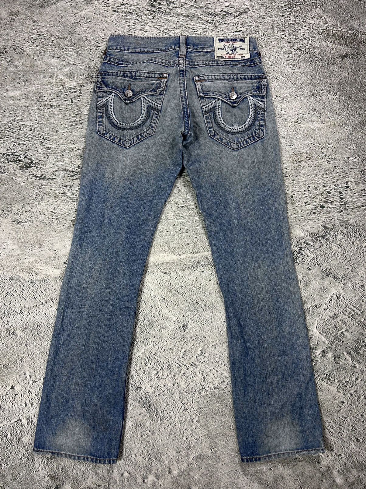 True Religion blue jeans white thick stitching straight