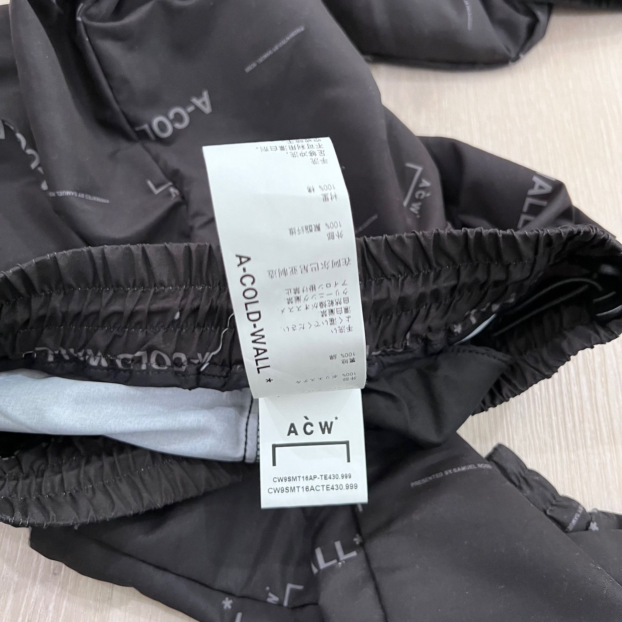 A-COLD-WALL* A-Cold-Wall* Black All-Over Logo Prints Nylon Jogger Pants Size US 30 / EU 46 - 6 Thumbnail