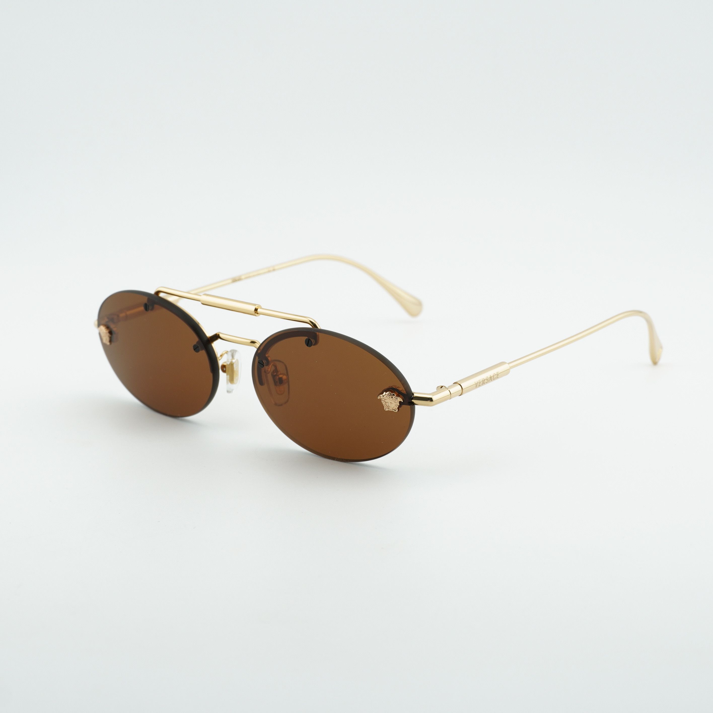Versace Versace VE2295 1002/73 Sunglasses Gold Oval Frame Size ONE SIZE - 1 Thumbnail
