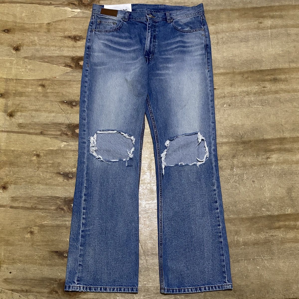 Blue Deconstructed Dirty Wash Bootcut Jeans by Andersson