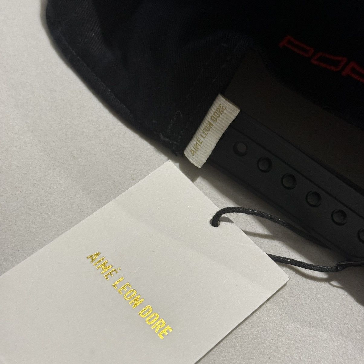 Aime Leon Dore × Porsche Design Aime Leon Dore Black Porsche Script Hat Size ONE SIZE - 8 Thumbnail