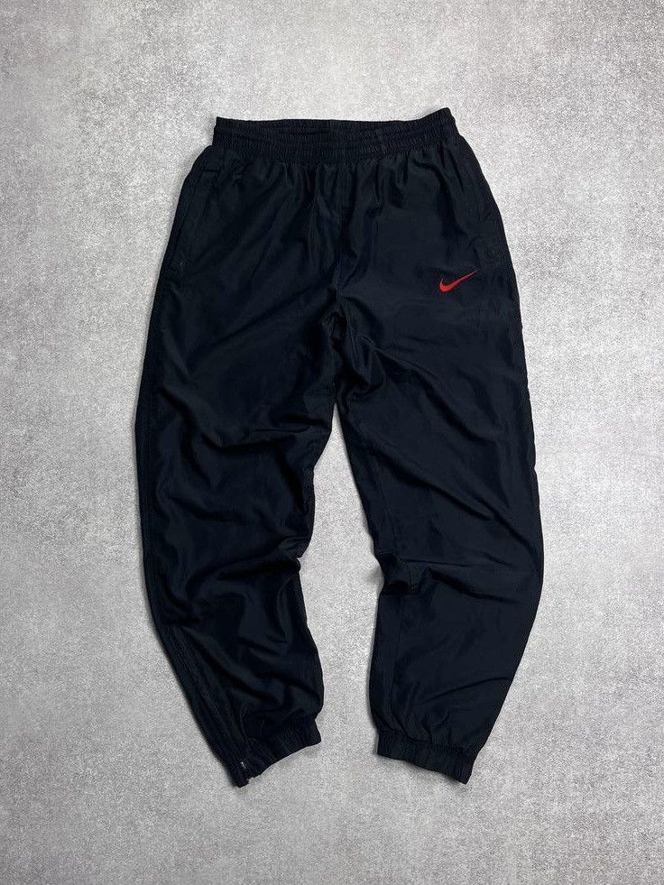 Nike × Vintage Vintage Nike Swoosh Baggy Nylon Trackpants S Size US 31 - 1 Thumbnail