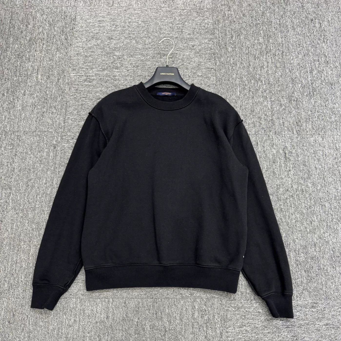 louis vuitton black sweatshirt with logo.