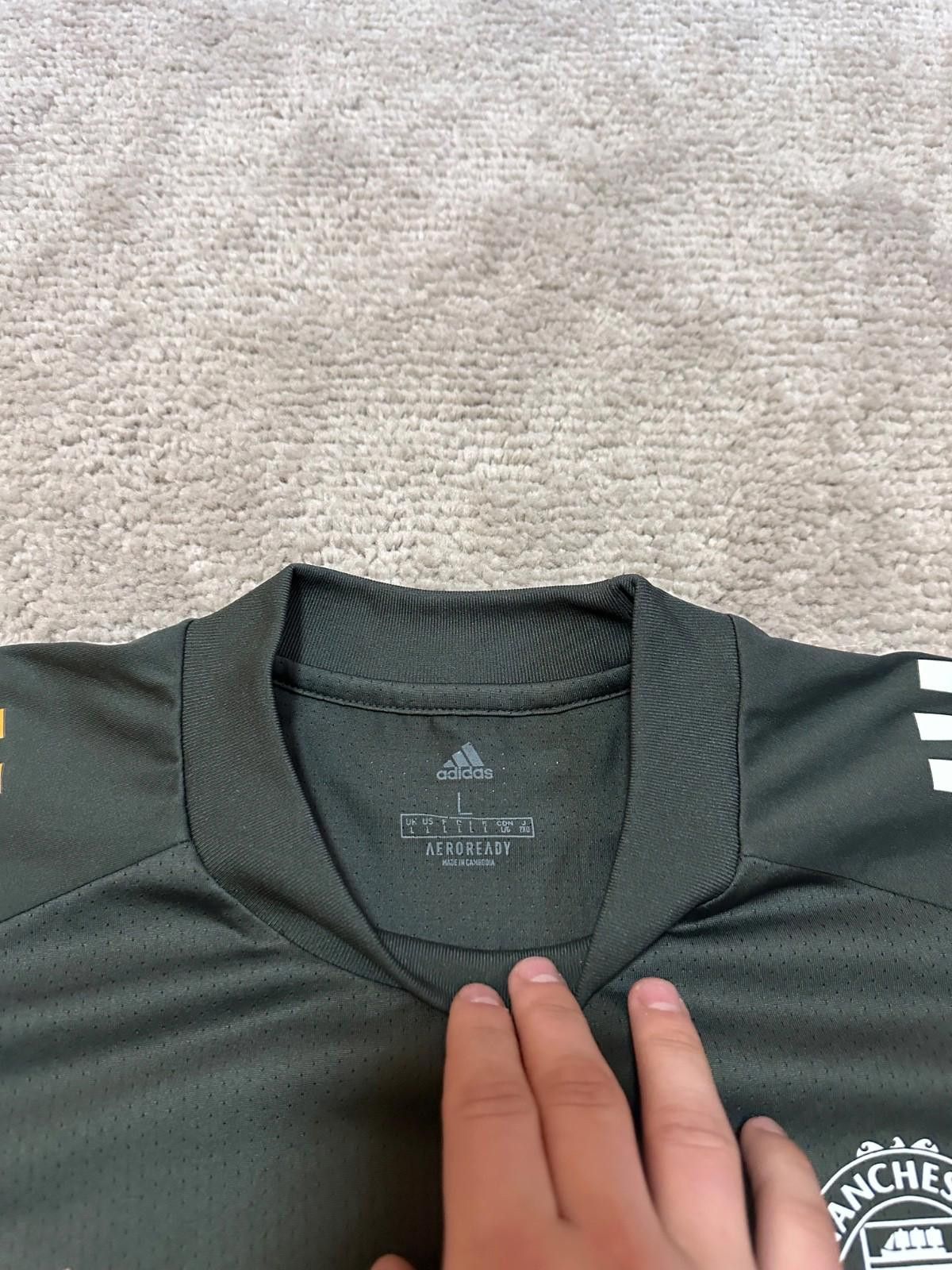 Adidas MANCHESTER UNITED 2020/21 FOOTBALL SOCCER TRAINING JERSEY Size US L / EU 52-54 / 3 - 4 Thumbnail