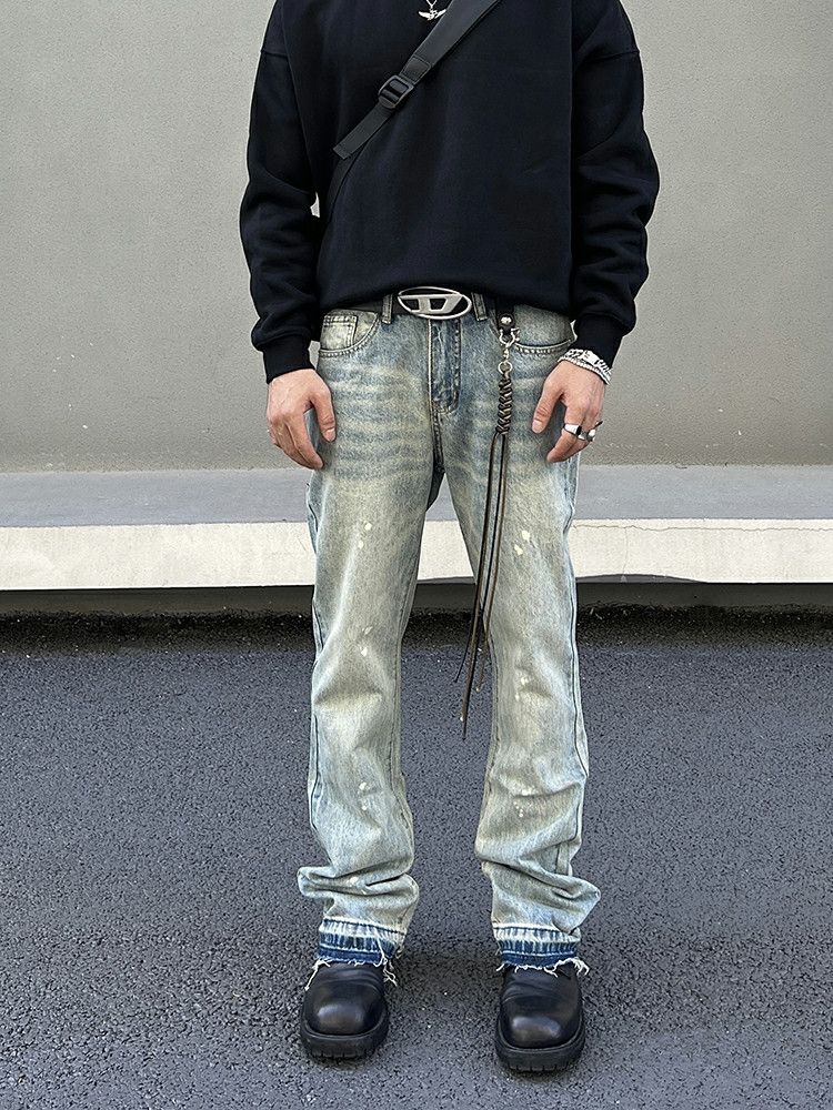 washed flared paint damaged jeans