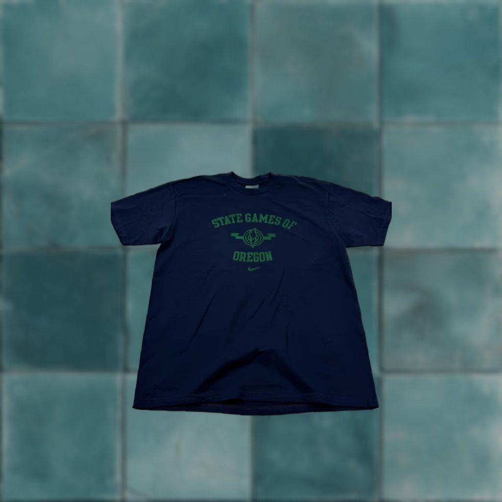 Nike VINTAGE Nike Shirt Mens Small Navy Blue State Games Of Oregon Graphic 2000s Crew Neck Short Sleeve Sports Tee Mens S Navy Blue Graphic Print Oregon 04 Size US S / EU 44-46 / 1 - 1 Thumbnail