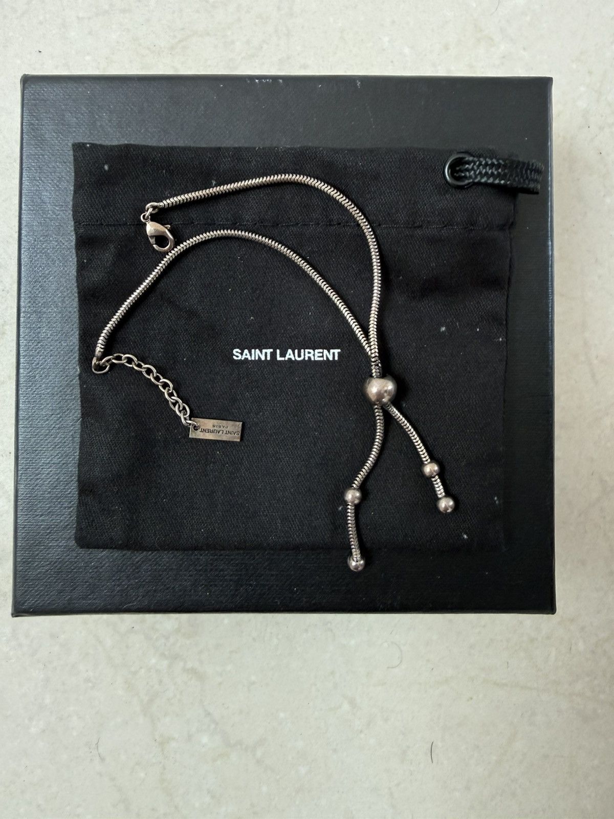 Saint Laurent Paris Saint Laurent Silver Bolo Tie Bracelet Size ONE SIZE - 1 Thumbnail