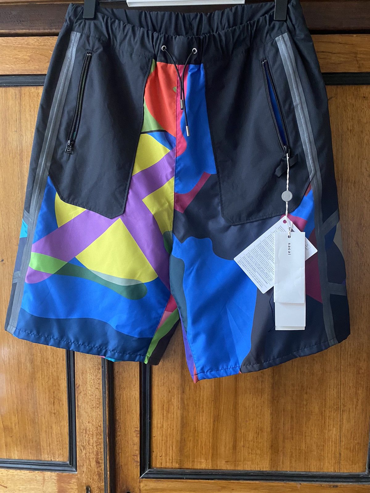 Kaws Kaws X Sacai printed drawstring shorts Size US 30 / EU 46 - 4 Thumbnail