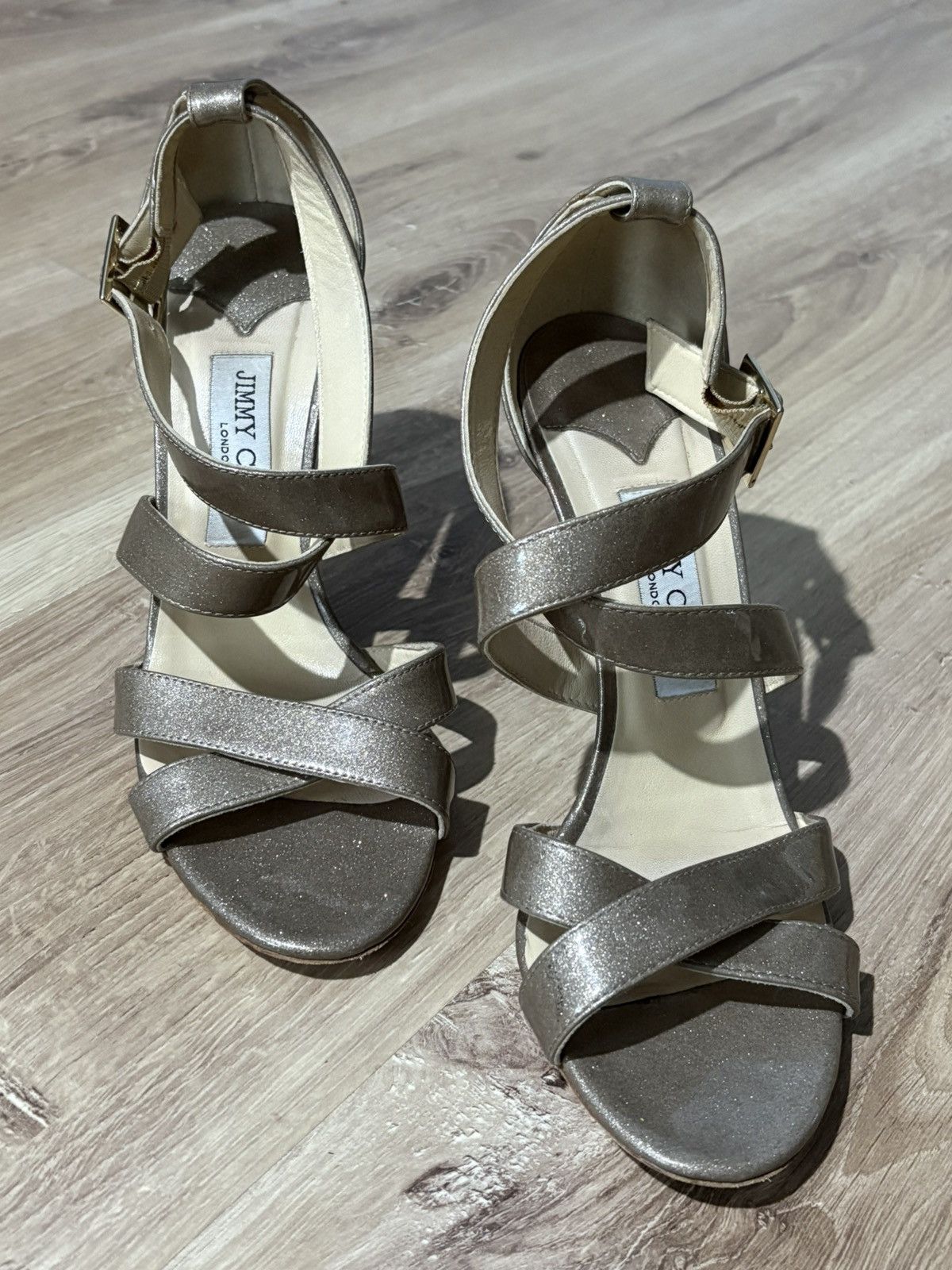サンダル・ミュール JIMMY CHOO Silver Nappa Leather Daisy Sandals Jimmy Choo Daisy sandals in silver nappa leather | The