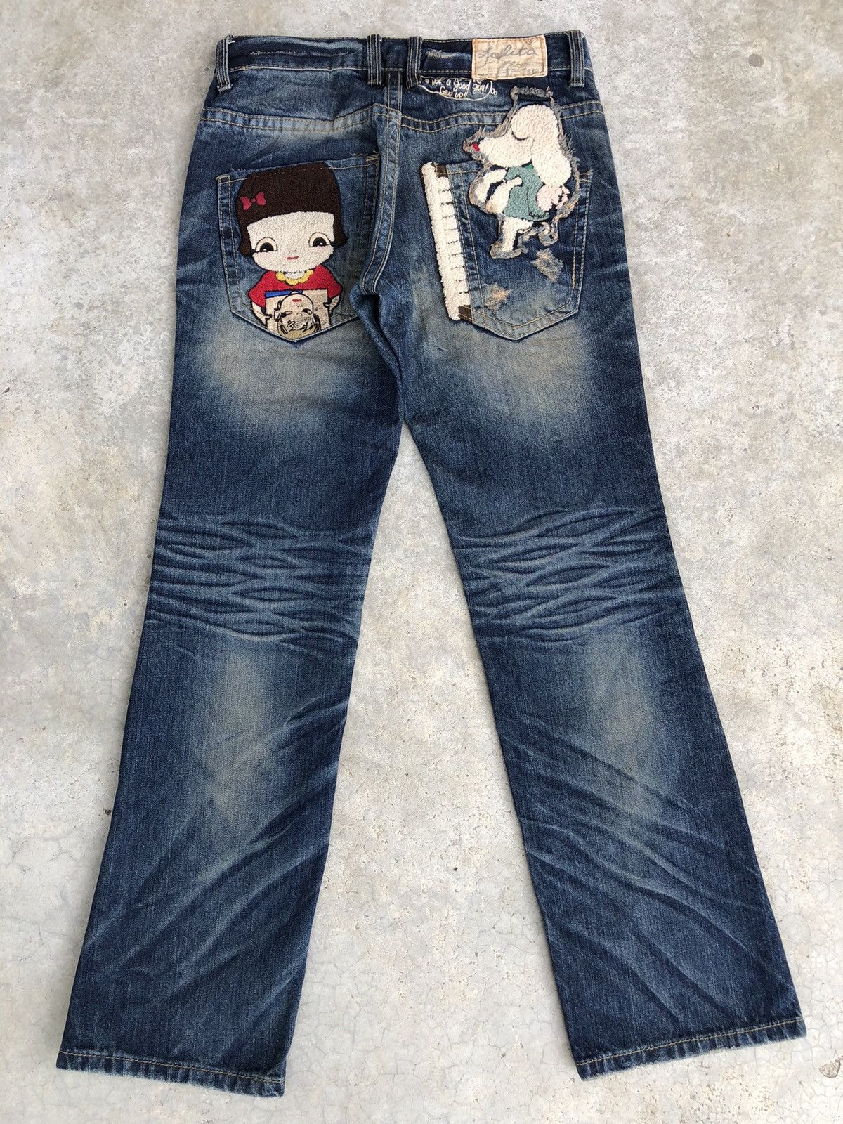 image of Designer Yoshitomo Nara Lolita Dog Embroidered Jeans Distressed in Blue, Men's (Size 30)