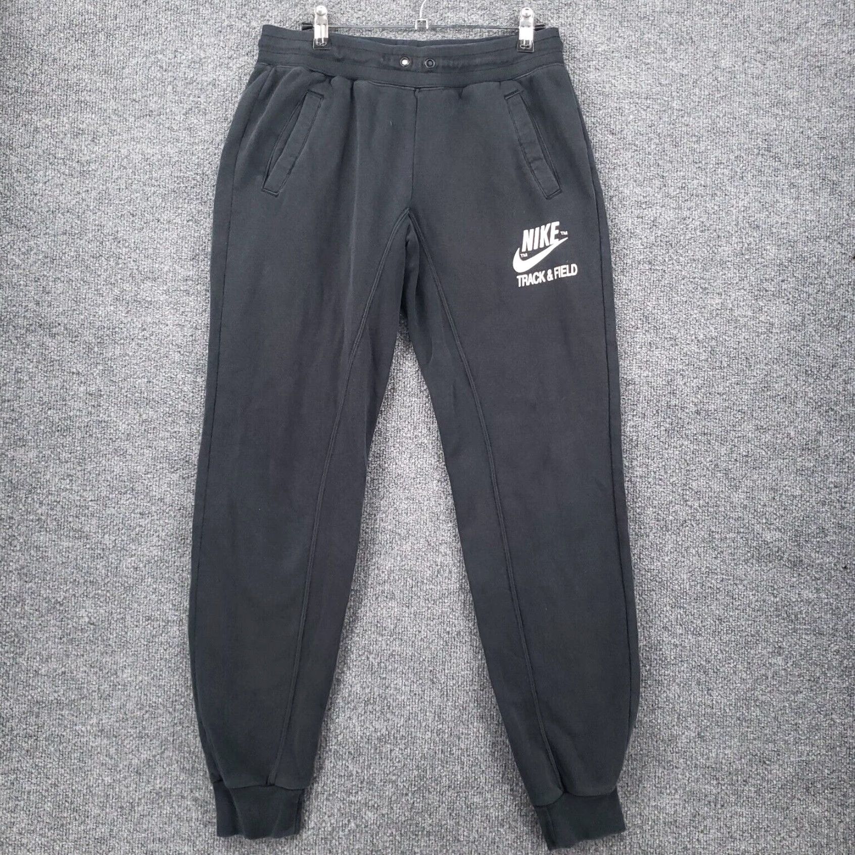 Nike track and field sweatpants best sale