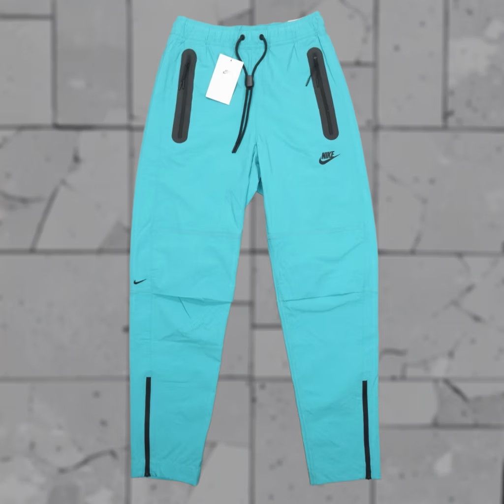 Nike Nike Tech Woven Pants Mens XS Dusty Cactus HM8241-345 Pants Regular Tapered Inseam 28 in Blue Nylon Spandex Cross Training Gym Running Activewear Size US 27 - 1 Thumbnail