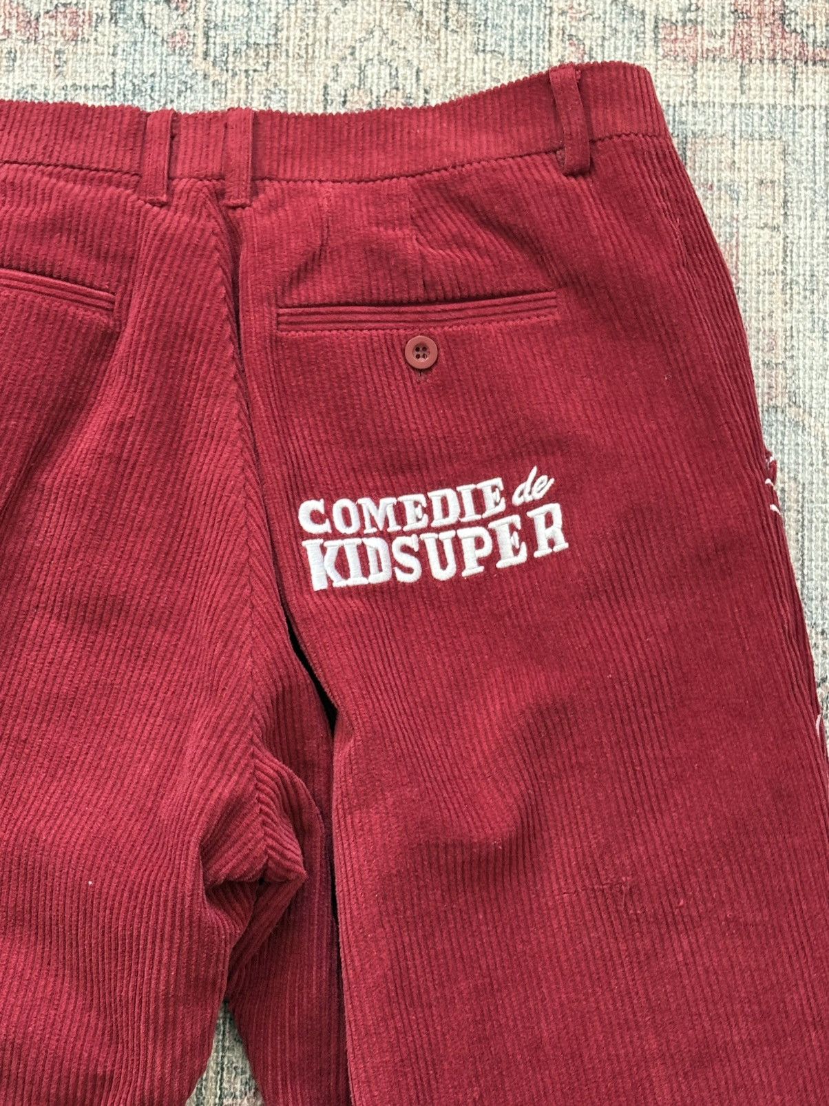 comedie de KidSuper Red Embroidered cotton trousers