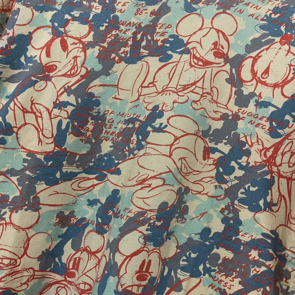 Comme des garcons disney all over print tee