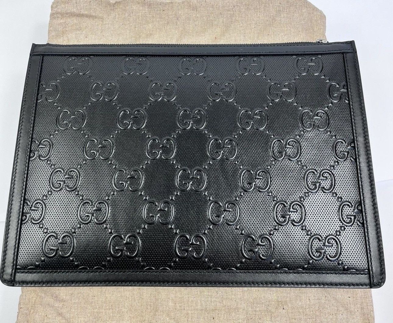 GUCCI GG BLACK EMBOSSED POUCH