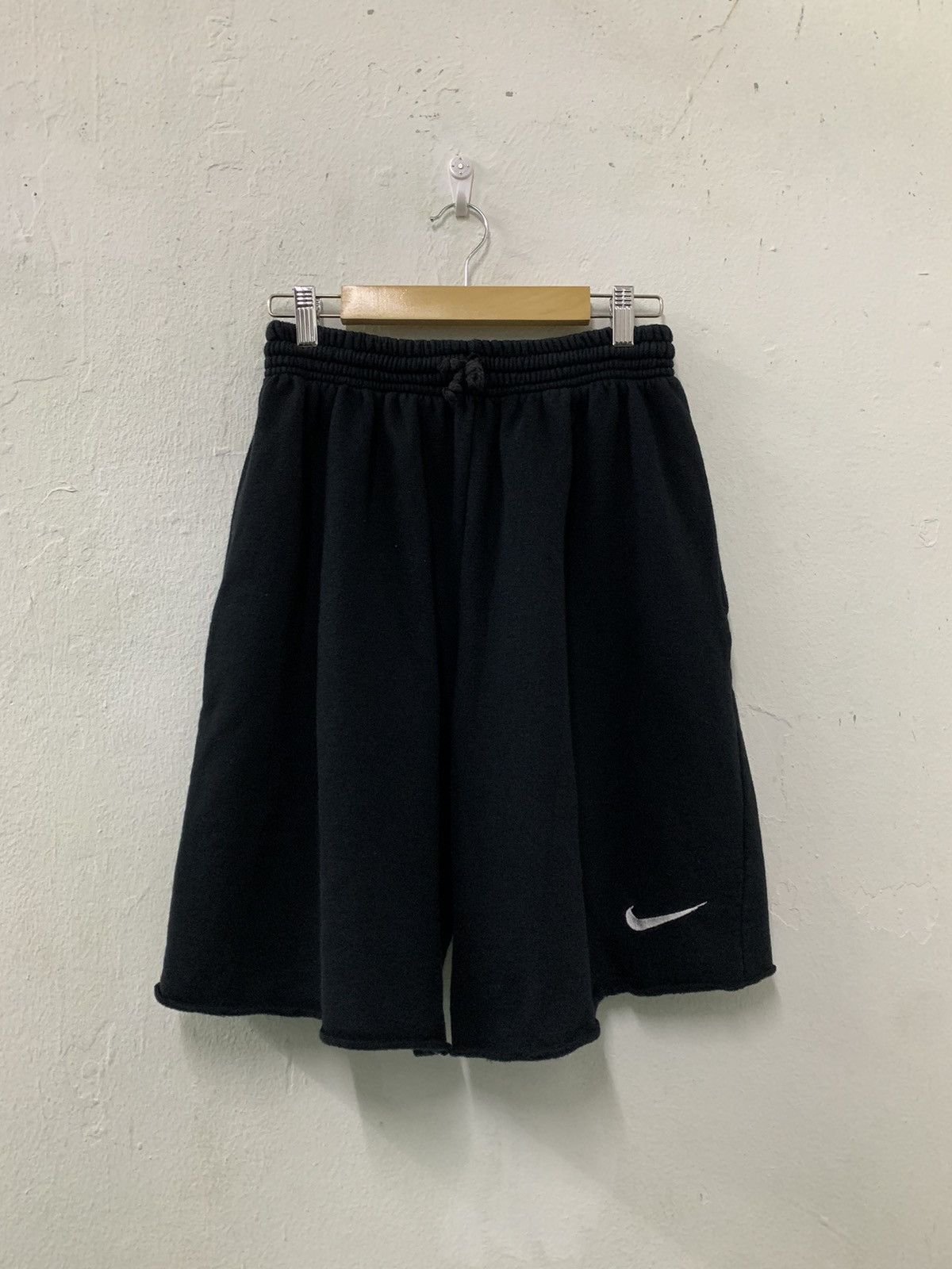 image of Nike Short Sweatpants Embroidered Swoosh in Black, Men's (Size 36)