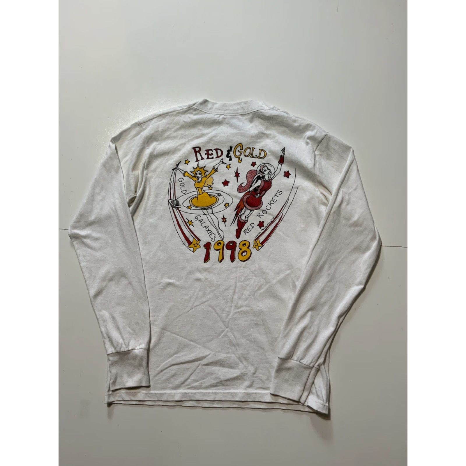 Fruit Of The Loom VINTAGE Lauren Montgomery Red Rockets & Gold Galaxies L/S Graphic T-Shirt M Mens Red 1998 Rocketeer T-Shirt Size US M / EU 48-50 / 2 - 3 Thumbnail