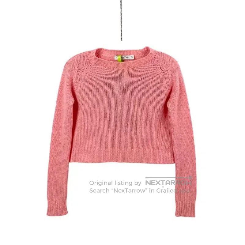 pink cashmere sweater by Dior.
