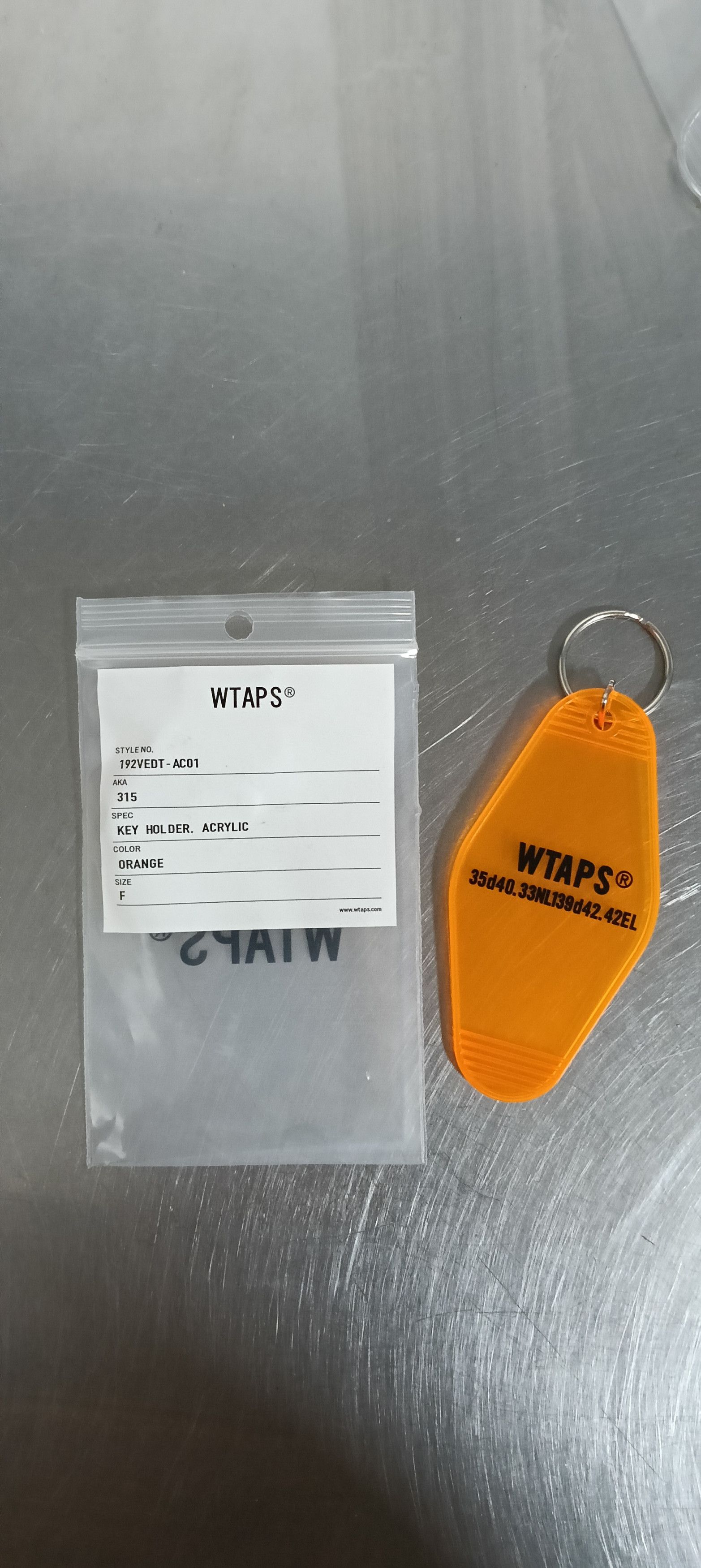 Wtaps WTAPS ACRYLIC KEY HOLDER KEYCHAIN ORANGE CLEAR Size ONE SIZE - 1 Thumbnail