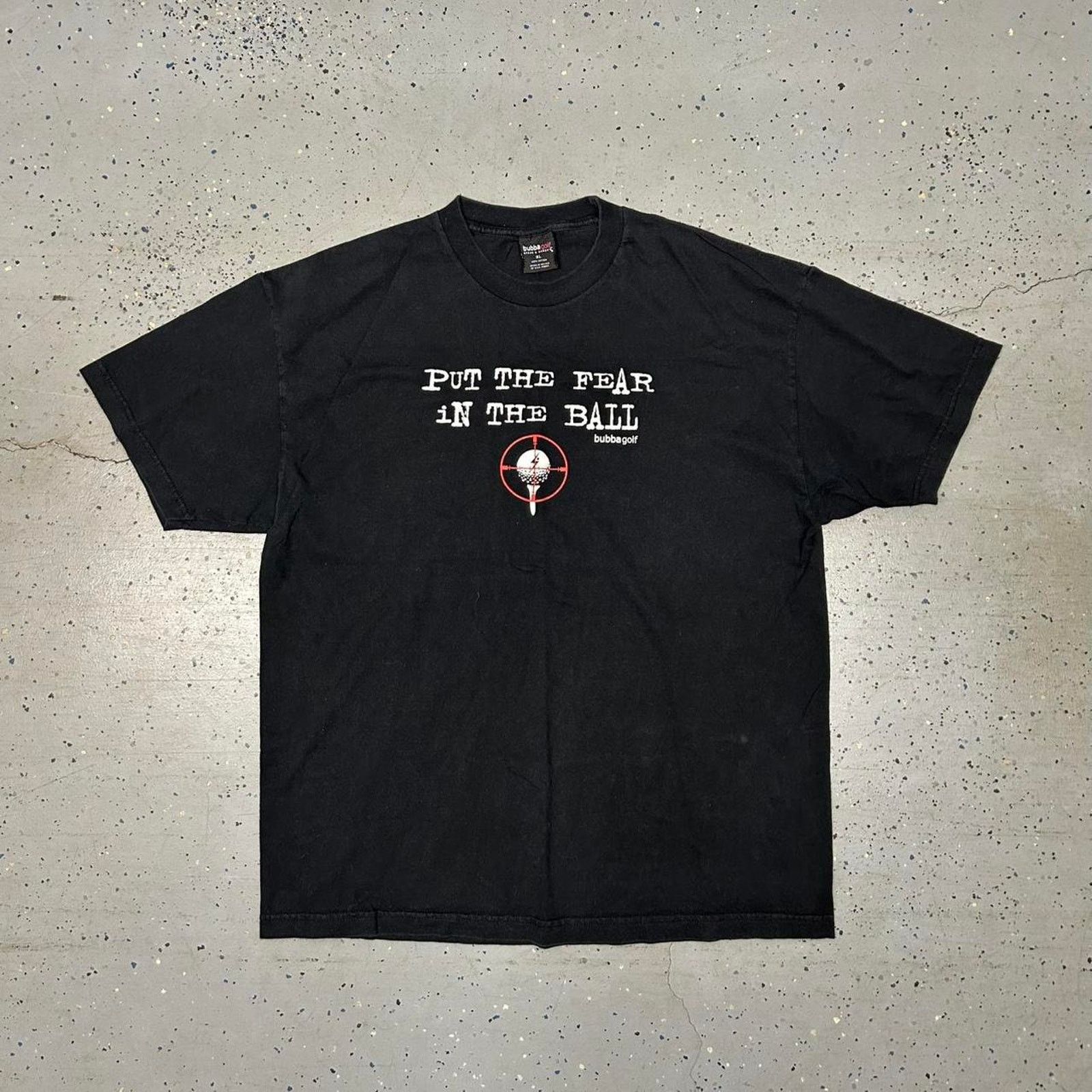 Other Black vintage golf tee with "Put the Fear in the Ball" Size US XL / EU 56 / 4 - 1 Thumbnail
