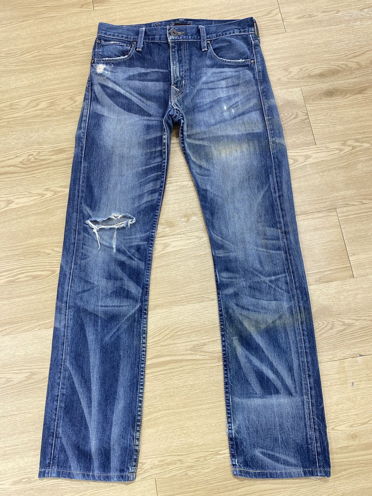 Levi’s Whiskers Blue Wash Style Buckle Back Distressed Jeans