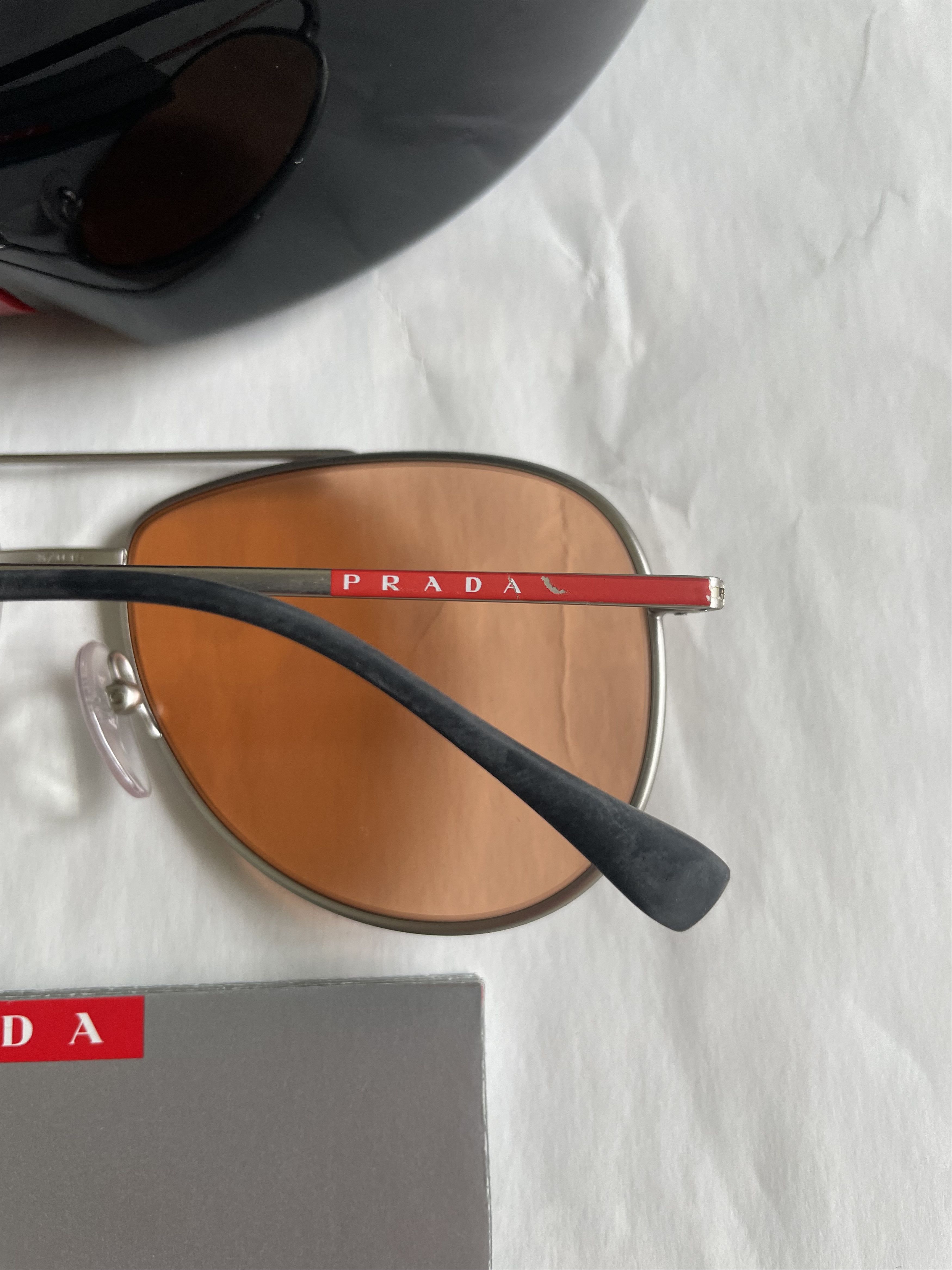 Prada PRADA SPORT SPS 55U QFP-291 SILVER/ORANGE LENS SUNGLASSES Size ONE SIZE - 7 Thumbnail