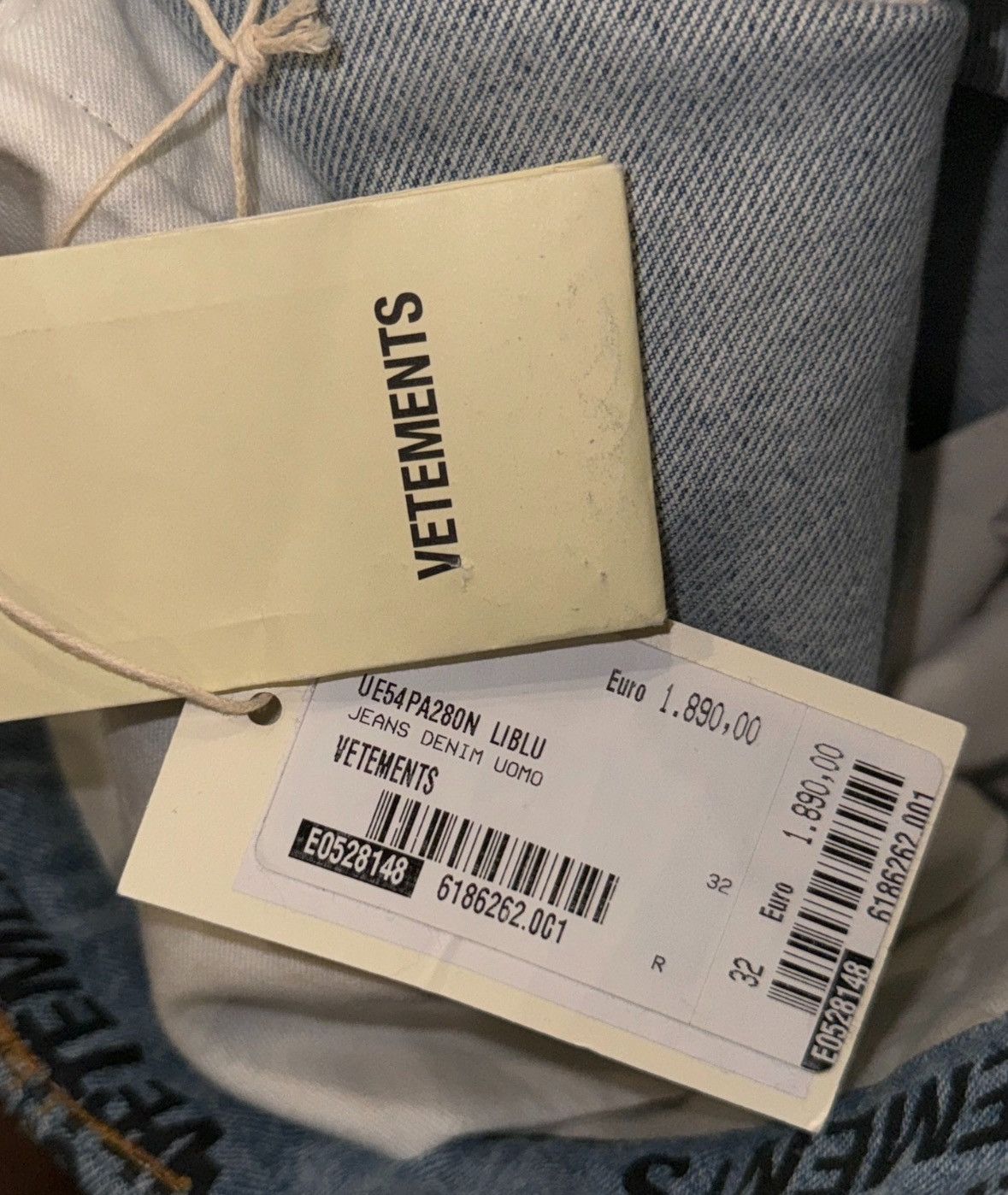 All over stamped logo transformer jeans