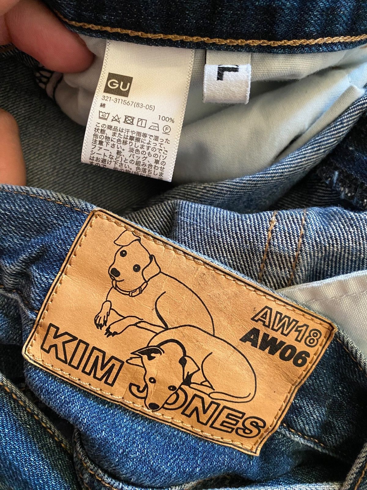 Kim Jones x GU distressed bondage denim
