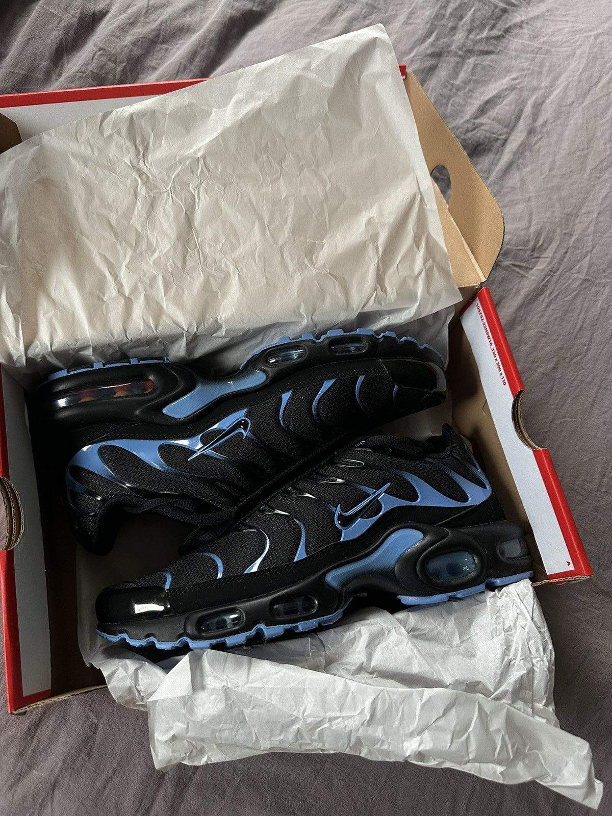 size 4 nike tn