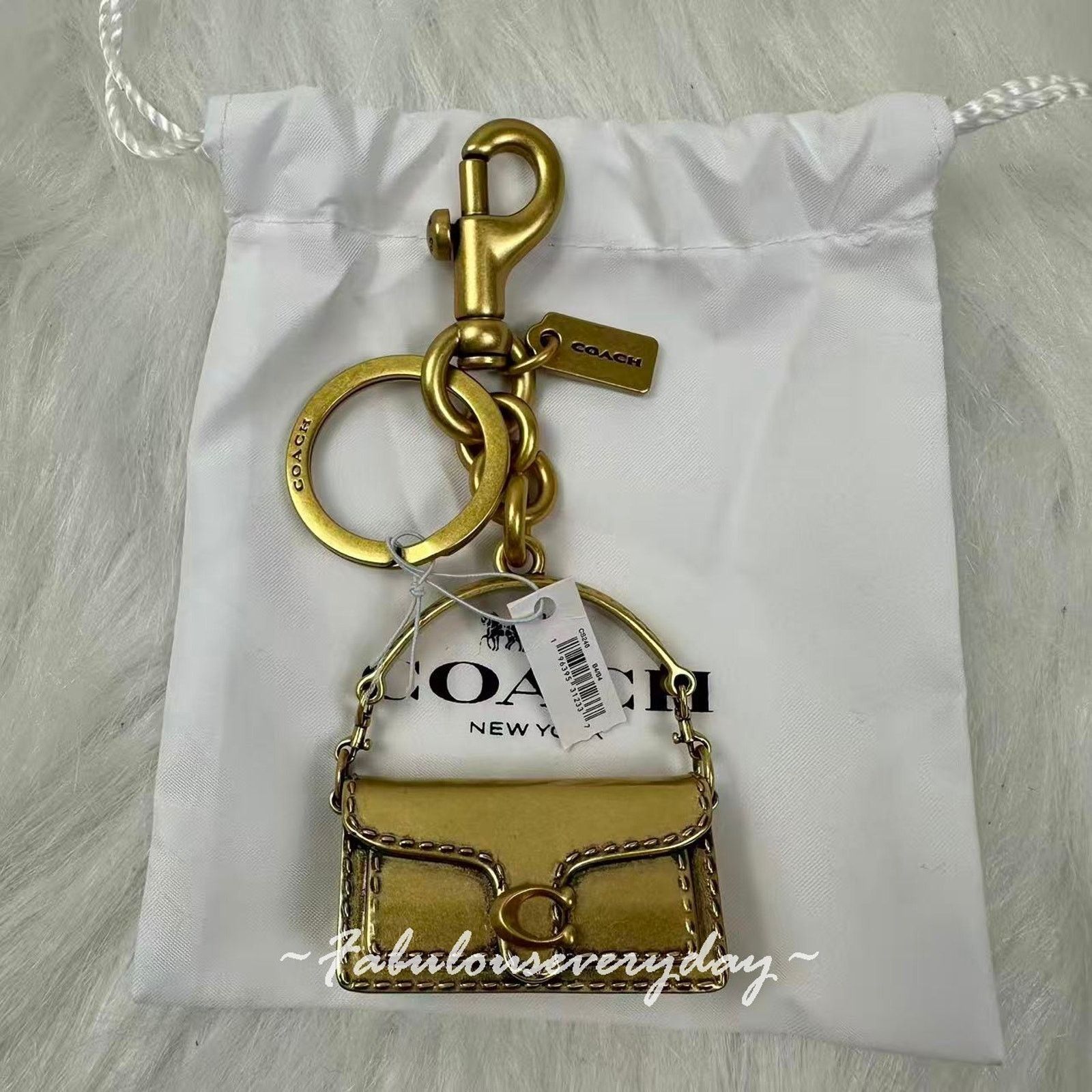 Coach Coach Tabby Bag Charm With Key Chain Keyring In Brass CS246 Size ONE SIZE - 1 Thumbnail