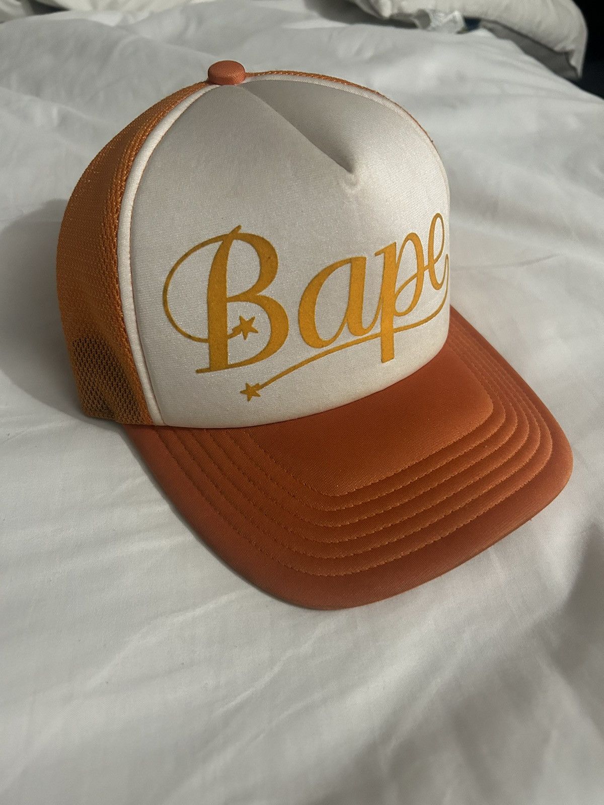 image of Vintage Bape Script Font Trucker Hat Orange, Men's